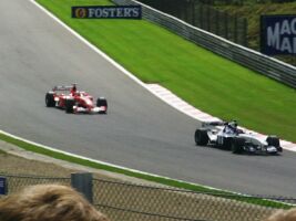 Montoya and Schumacher approaching Pouhon